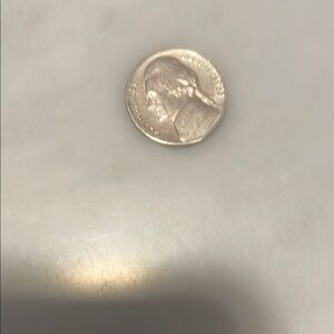 Silver Coin with In God We Trust Inscription